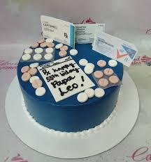 Cake 1 Tier Fondant - white, pink, brown theme with printout of Captopril pill box and edible 2D white round pills