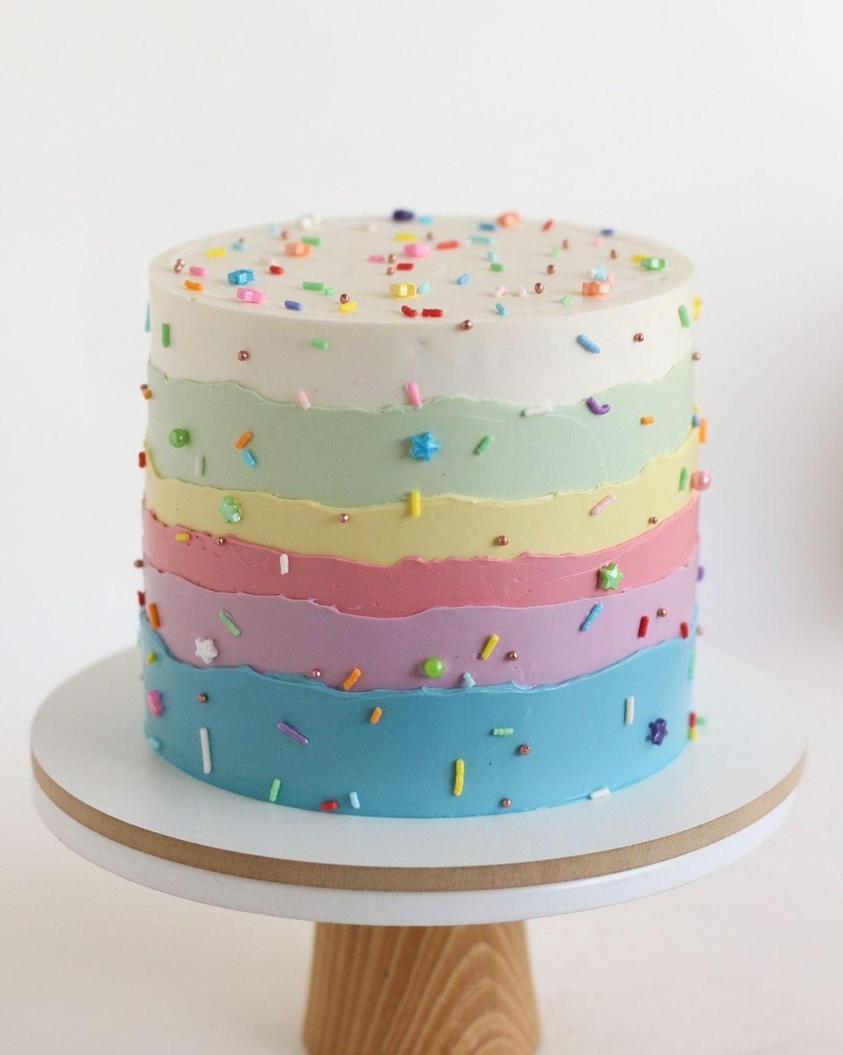 rainbow pastel 1 Tier - red theme with multi-colored sprinkles and star shapes