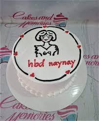 reading birthday 1 Tier - colorful theme with Icing doodle of a person reading a book and Small icing hearts