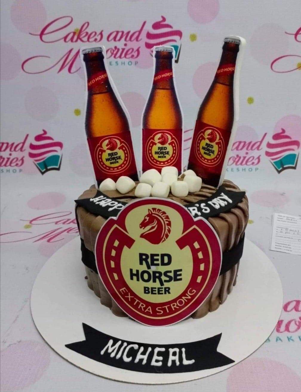 Red Horse Beer themed chocolate cake with beer bottle printouts and white marshmallow foam accents.
