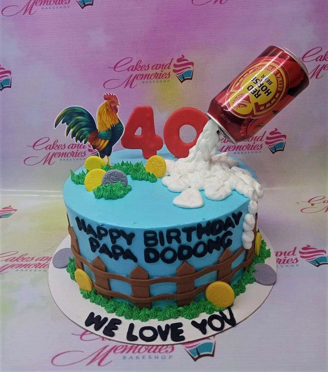 Light blue birthday cake for Papa Dodong with a Red Horse beer can topper, a rooster printout, and fondant fence and grass details.