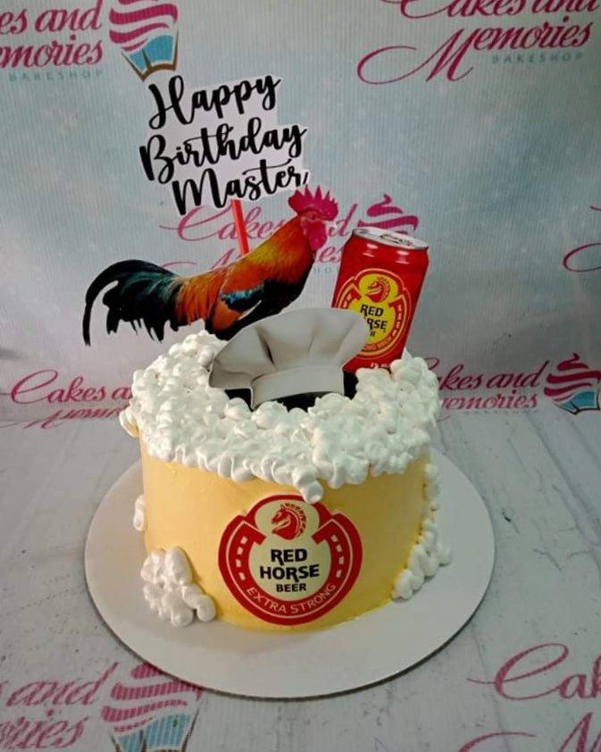 Yellow beer-themed birthday cake with Red Horse beer logo, a rooster printout, a beer can, and white icing foam.