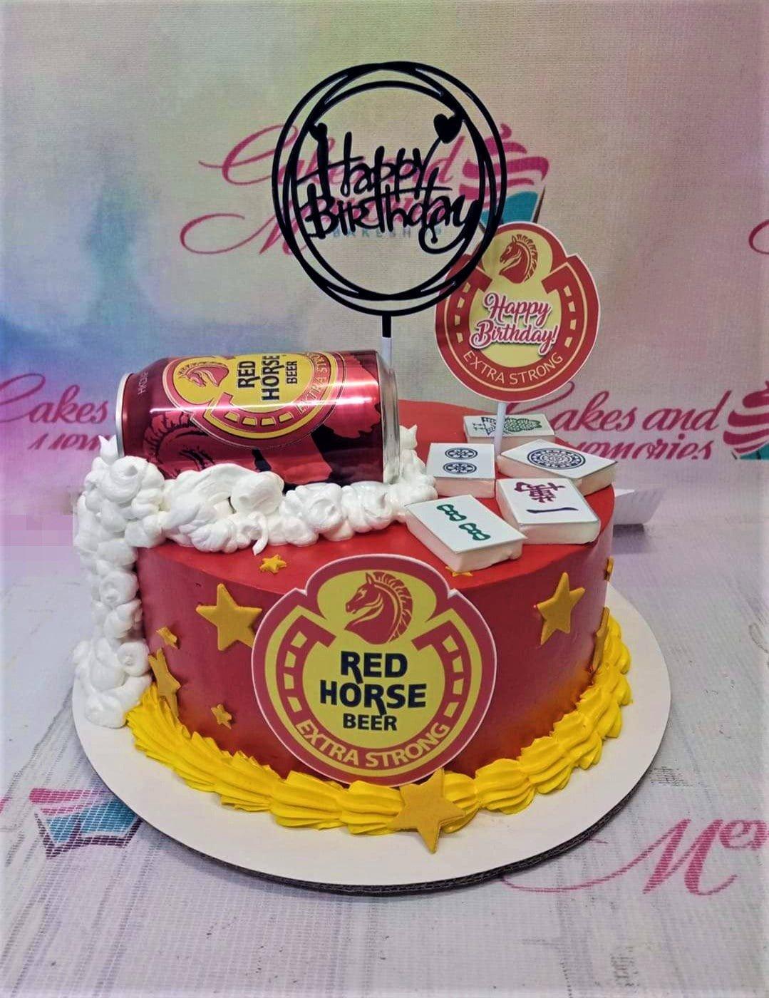 Red Horse Beer and Mahjong themed birthday cake with red icing, gold stars, and a beer can topper.