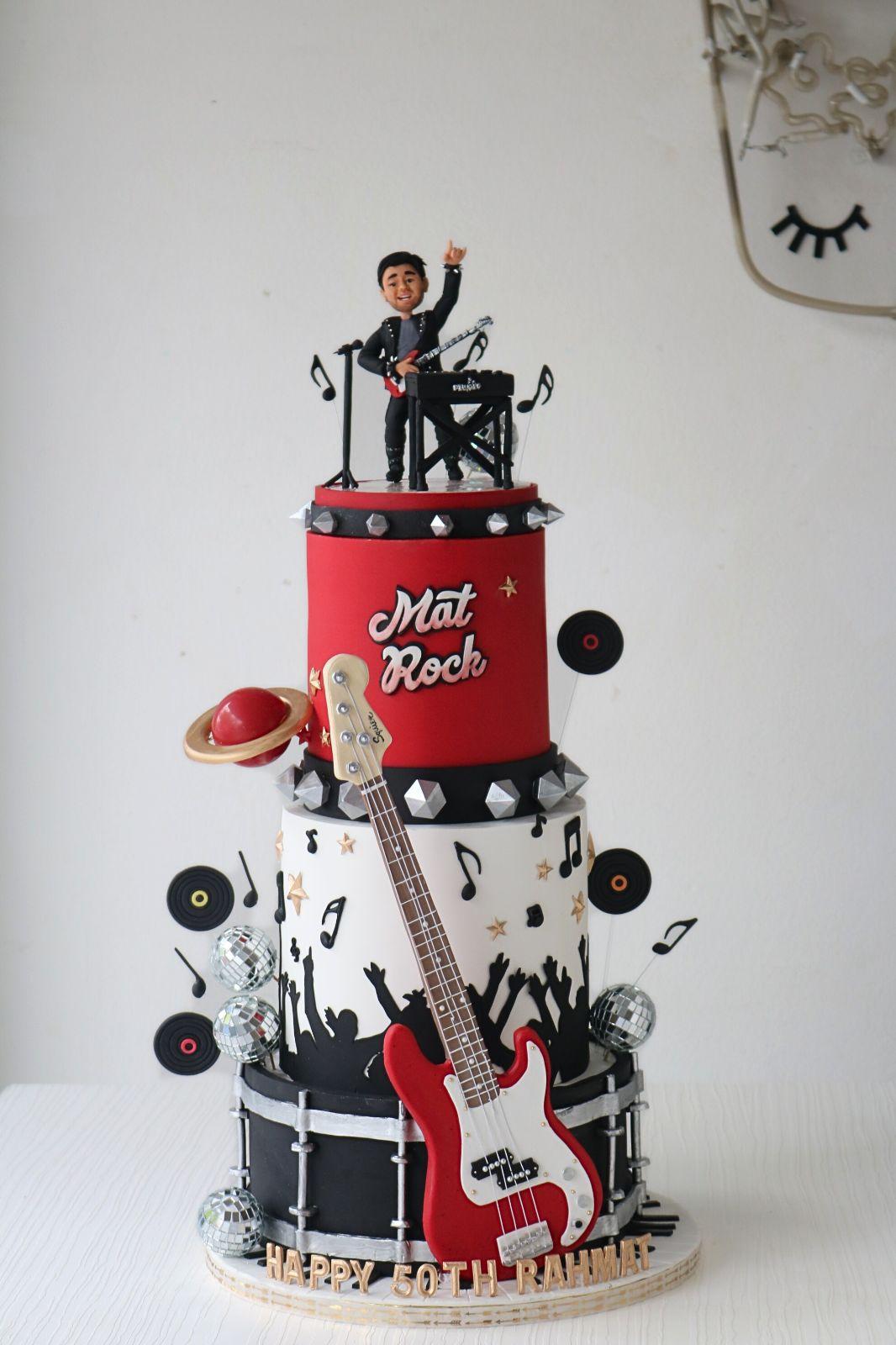 rockstar music 3 Tier Fondant - red, white, black theme with singer figurine with microphone and black music notes on sticks