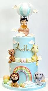 safari hot air balloon 2 Tier Fondant - blue, light, white theme with boy in hot air balloon and rainbow