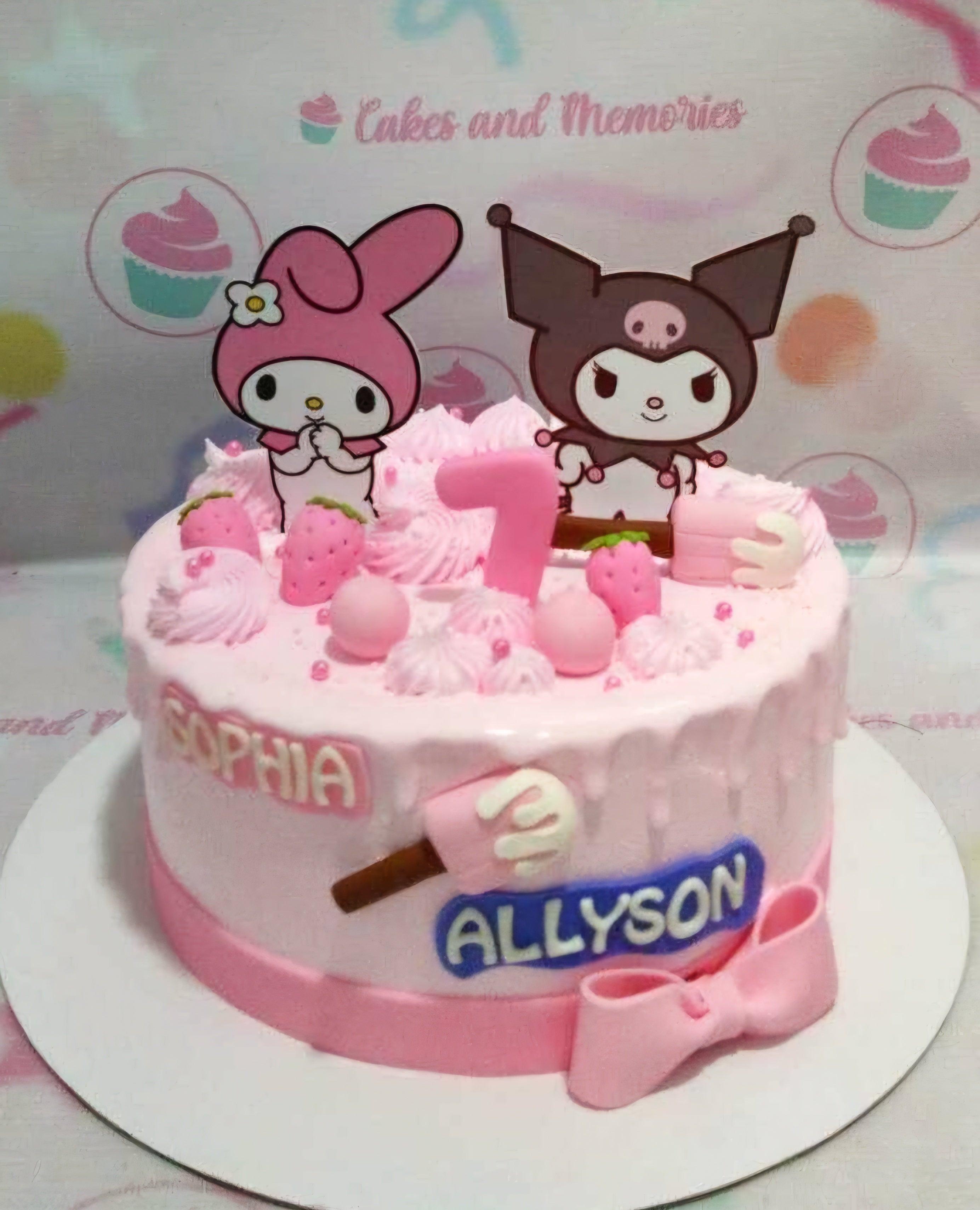 Pink Sanrio themed cake featuring My Melody and Kuromi printouts with pink icing swirls and strawberry decorations.
