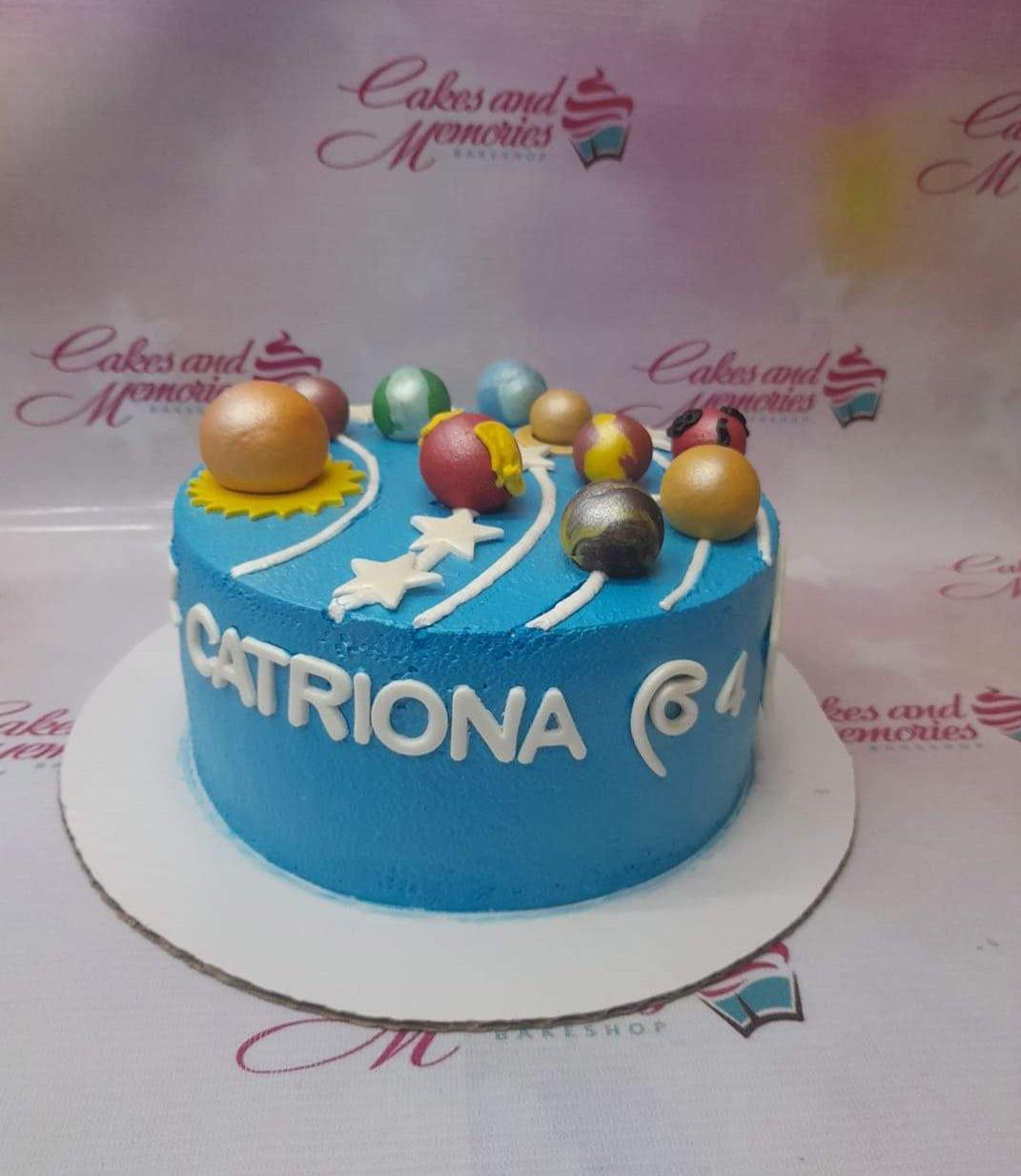 Blue solar system themed birthday cake with 3D fondant planets and white stars for Catriona's 6th birthday.