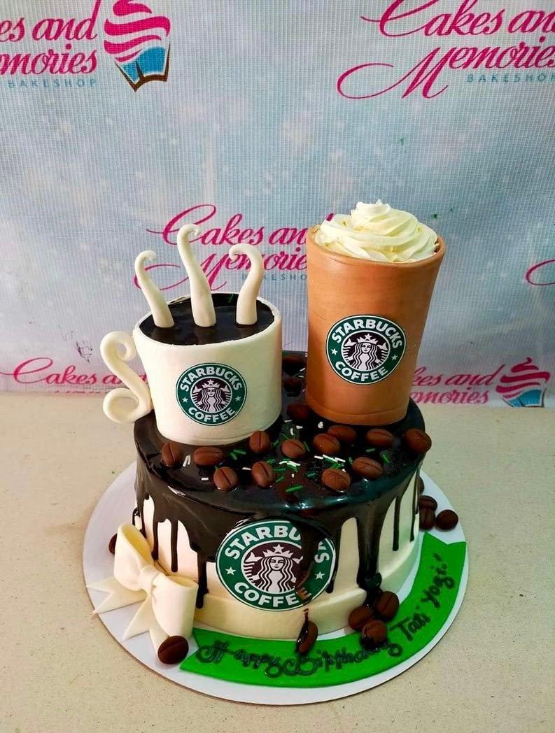 Starbucks themed birthday cake with a coffee cup and frappe topper, chocolate drip, and fondant coffee beans.