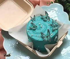 teal butterfly Bento - white theme with group of 7 assorted butterflies and white spherical dragees