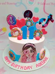 TikTok 11th birthday 1 Tier - blue, red, pink theme with TikTok logo toppers and girl with donut image