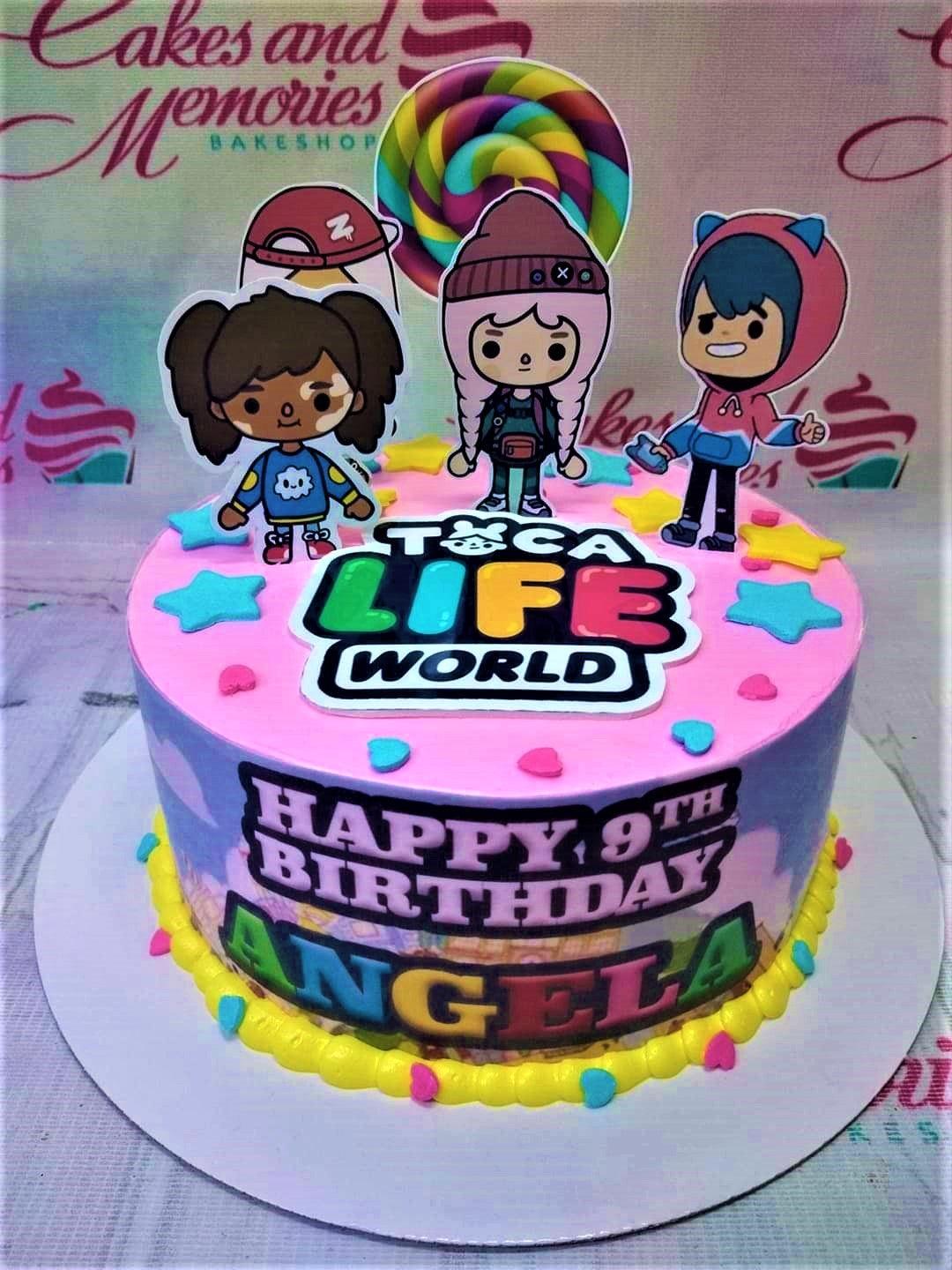 Pink Toca Life World themed birthday cake with character printouts, colorful stars, and a rainbow lollipop topper.