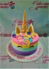 unicorn birthday 1 Tier - colorful theme with edible 3D unicorn horn and small edible flowers