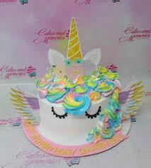 unicorn 1 Tier - yellow, white, gold theme with Yellow unicorn horn and Multi-colored icing swirls on top