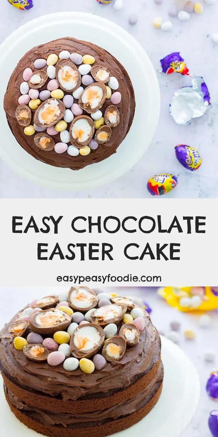 Chocolate Easter cake topped with Cadbury Creme Eggs and mini chocolate eggs on a white cake stand.