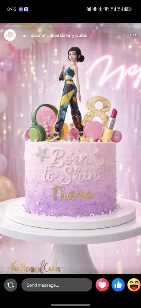 Purple and pink gradient cake with a 3D girl figurine, headphones, lipstick, and a glittery number 8 topper.